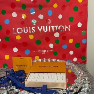 Authentic sealed brand new Louis Vuitton set of 8 in Box